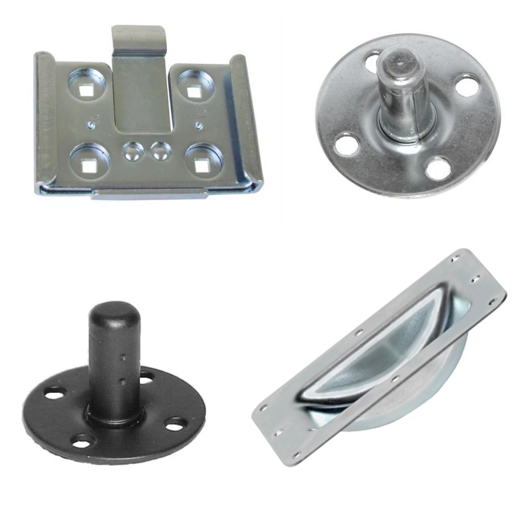 Various metal caster accessories for road cases including mounting plates and brackets for secure attachment